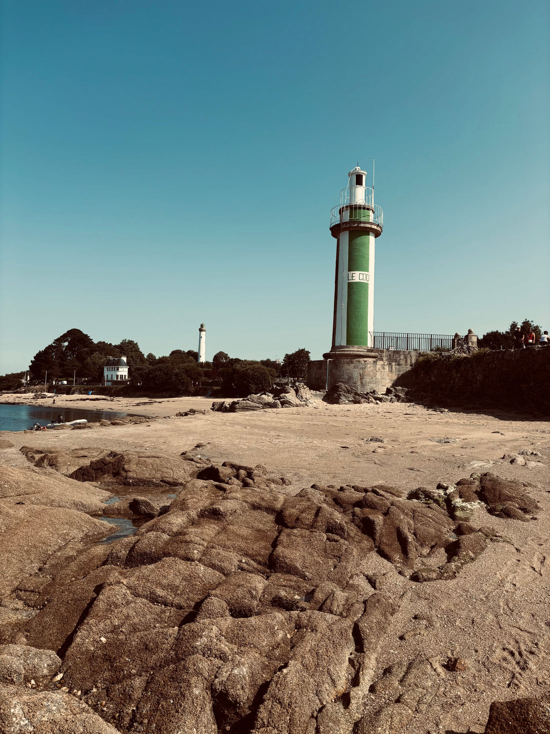 Lighthouse in Benodet, France. A sunny day when you'd need to protect your bald head.