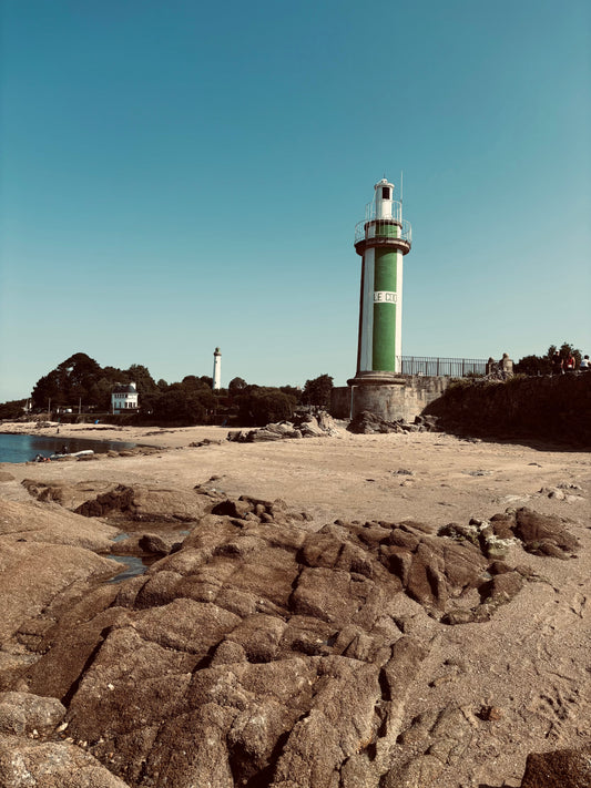 Lighthouse in Benodet, France. A sunny day when you'd need to protect your bald head.