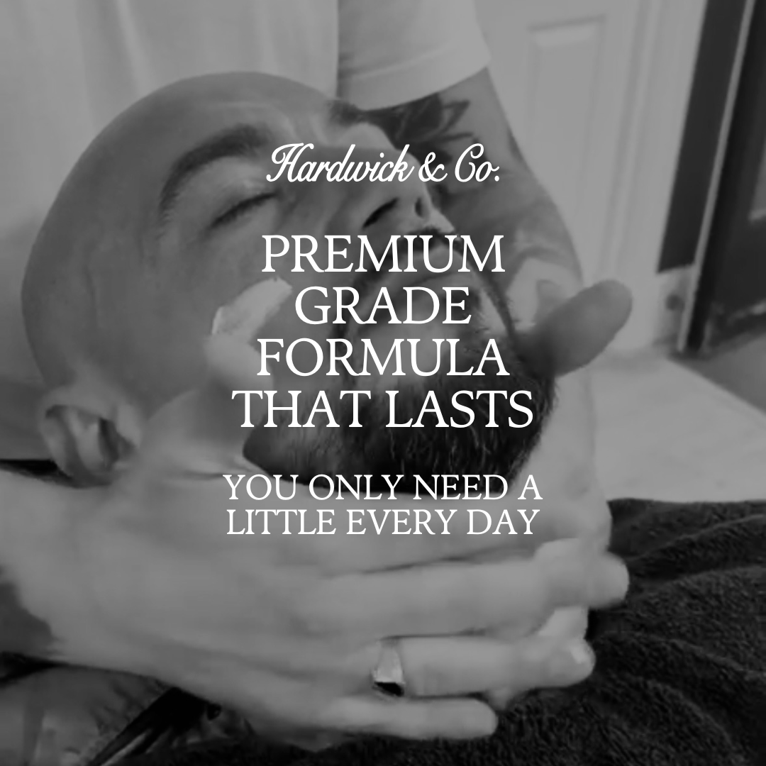 Bald Man Getting A Face Massage Saying Premium Grade Formula That Lasts
