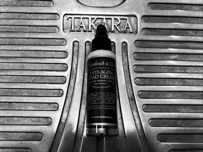 Tube of Hardwick & Co. Anti Aging cream on a metal surface with 'Tatler' branding.